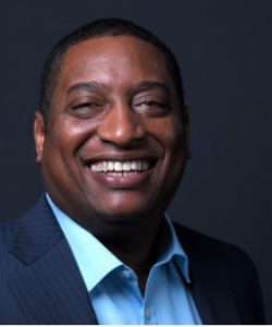 Headshot of Lionel Phillips, Founder & President of Inside Edge Consulting Group, Inc and Board Member at CARE Pharmacies.